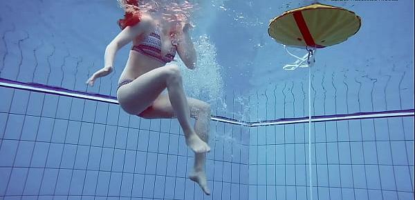  Big tits teenie Liza Bubarek swimming naked in the pool